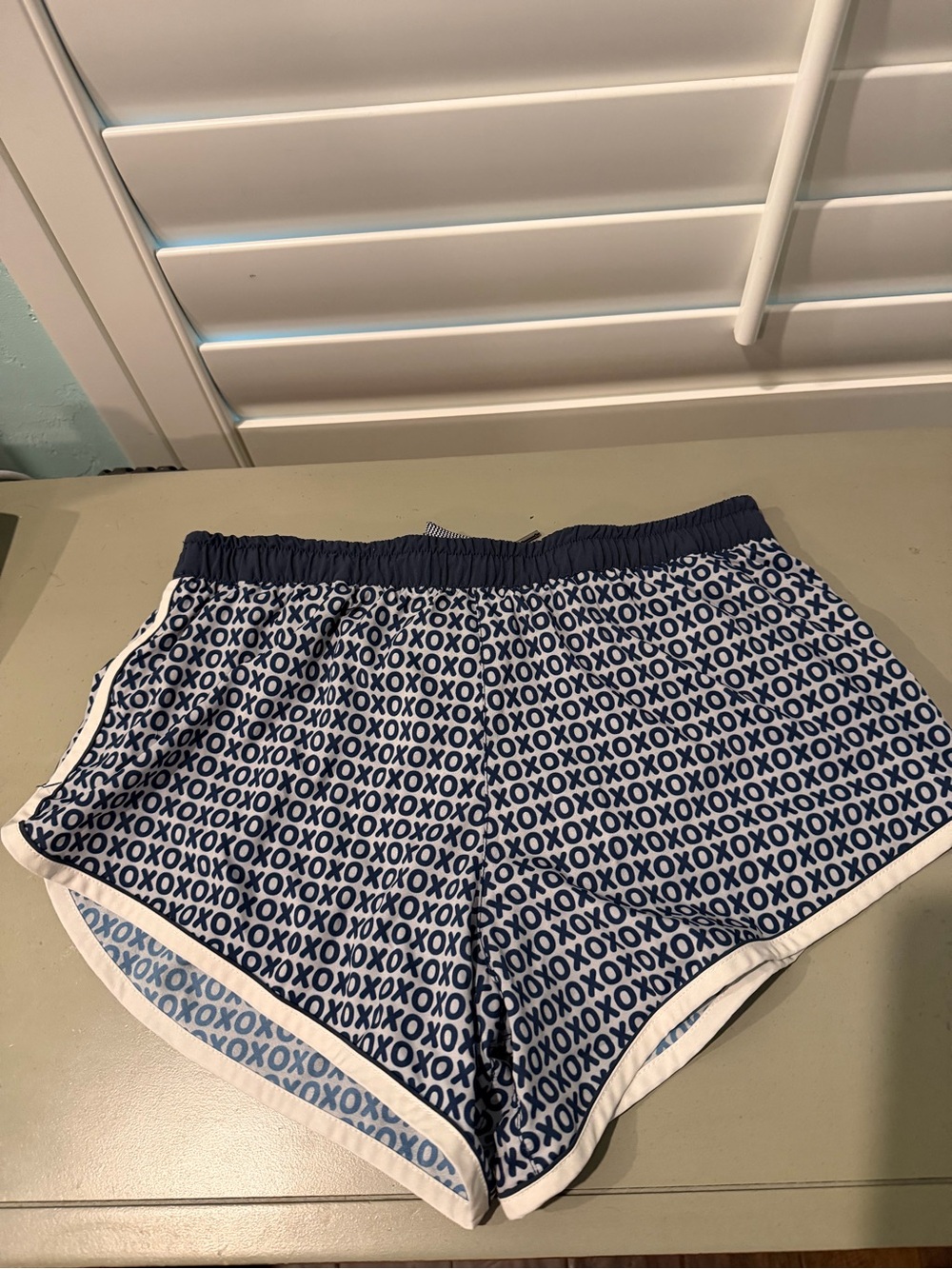 Women’s Navy X and O Love All Repeats 4 inch Athletic Shorts size medium